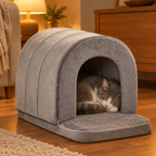 Cat curled up asleep inside the plush grey cave pet house