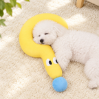 White dog resting its head on the yellow plush pet pillow