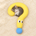 Kitten curled up asleep in the curve of the yellow plush pet pillow