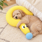 Small dog sleeping with its head on the yellow plush pet pillow